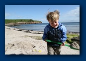 The water was too cold to swim but sand was good enough for digging.